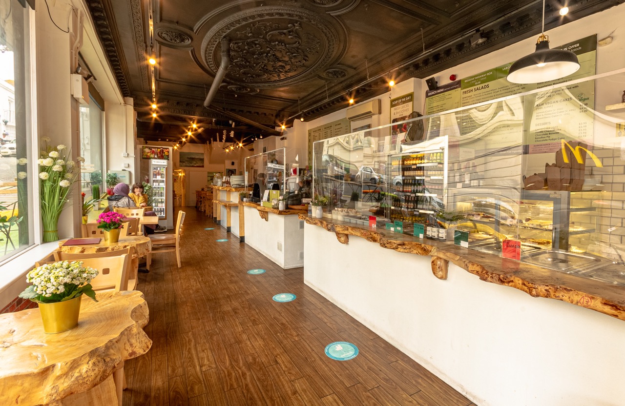 Foodilic restaurant interior with ornate ceiling